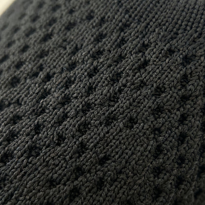 Close-up of the breathable stretch knit upper on ALBA Minuit slingback flats.