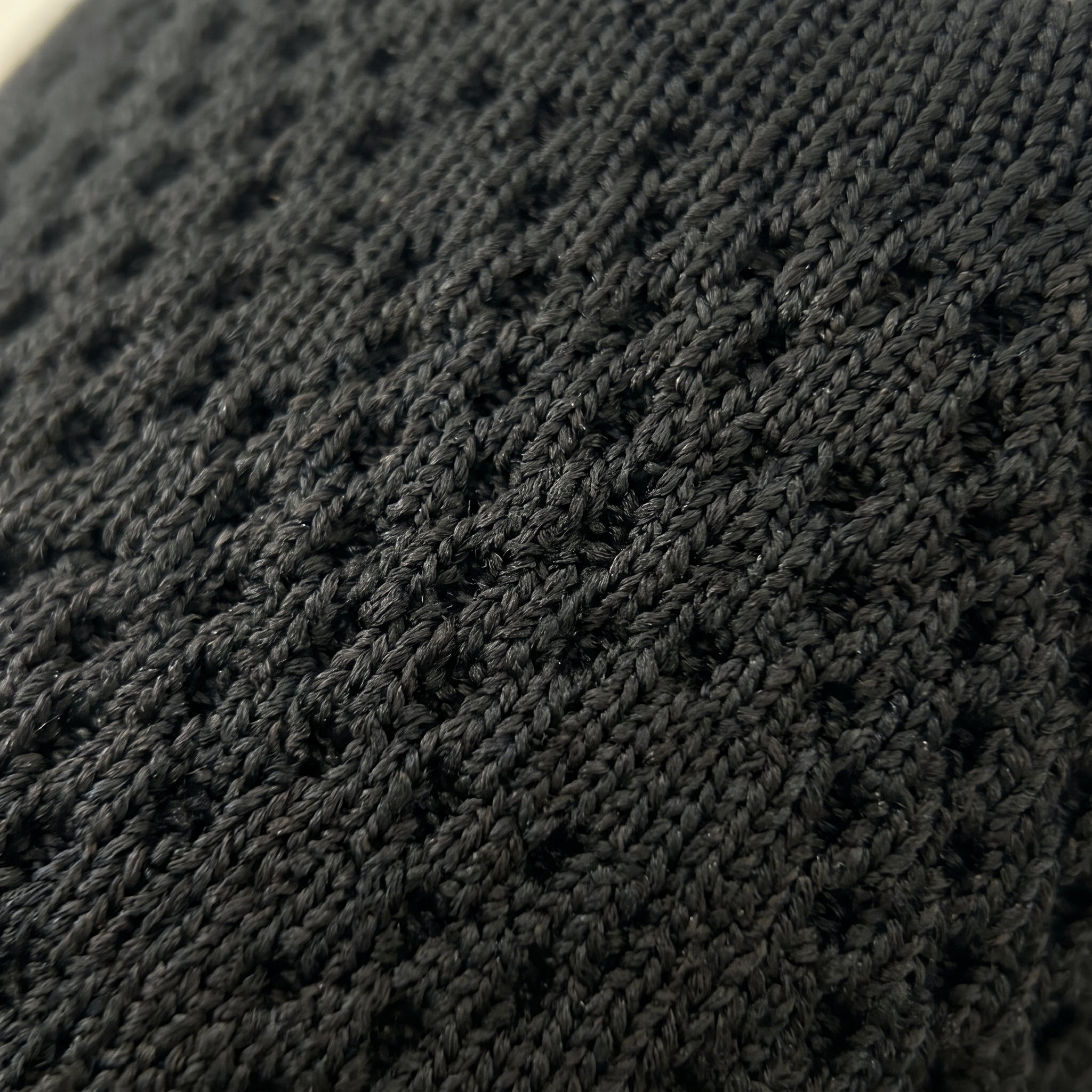 Close-up of the breathable stretch knit upper on ALBA Minuit slingback flats.