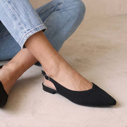 Side view of ALBA Minuit black knit slingback flats highlighting the breathable knit upper.