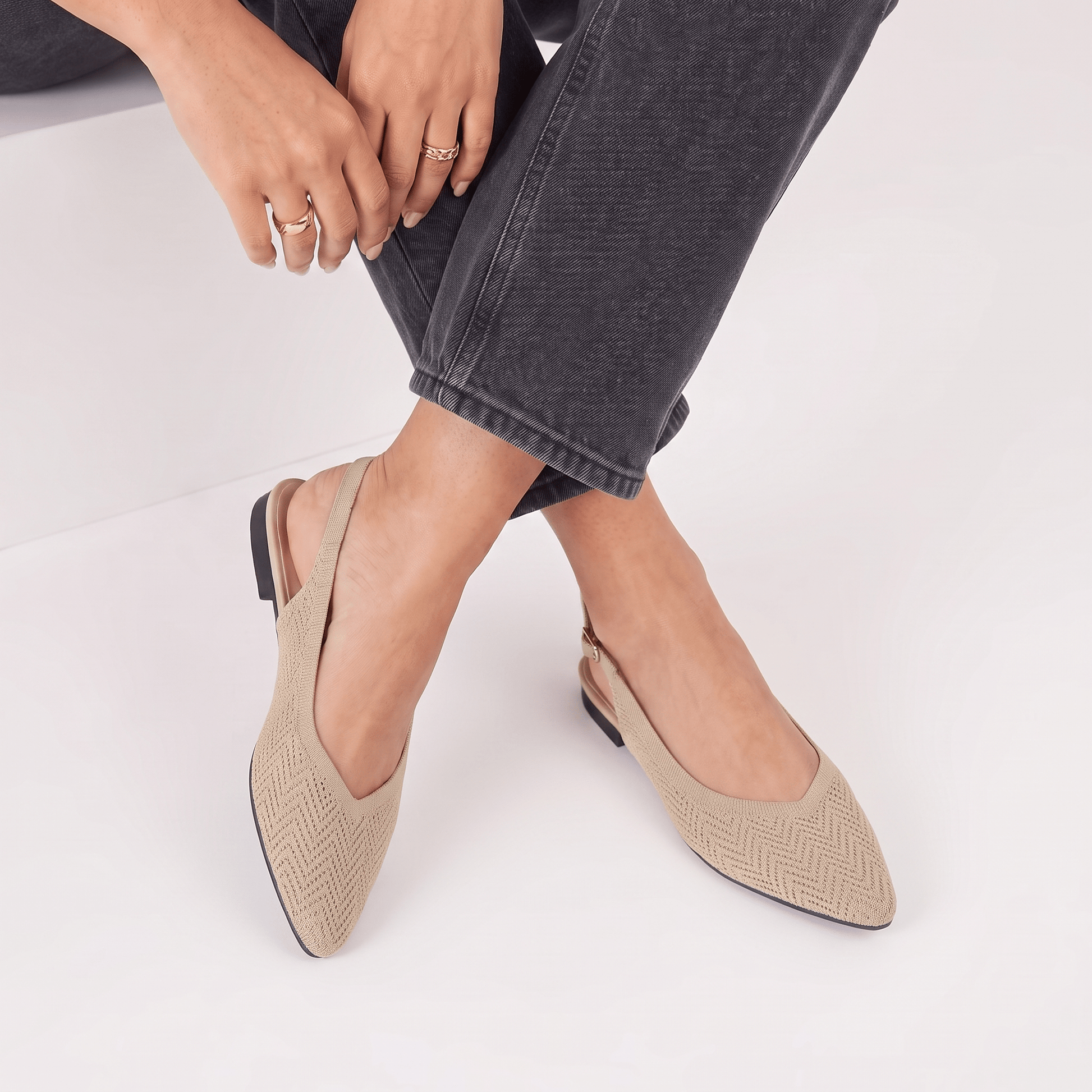 ALBA Dune — Neutral Knit Slingback Flats, worn with ankles crossed